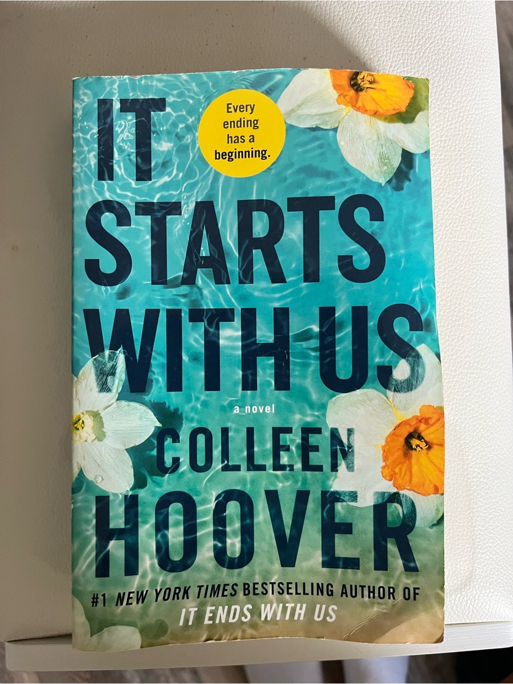 "It Starts With Us" Paperback - Turquoise Cover